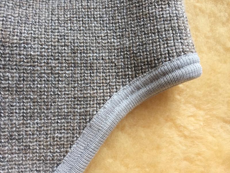 Schurwollmütze mit Ohrklappen